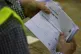 Ballot papers are counted through the night after votes were