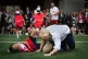 Boris Johnson flattens a Japanese school boy at a street rug