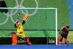 Maddie Hinch saves a penalty from Netherland's Maartje Paume