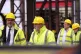 Jeremy Corbyn (right) is given a tour by Managing Director D