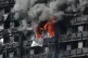 Smoke billows from a fire that has engulfed the 24-storey Gr