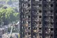 Firefighters battle the blaze in Grenfell Tower