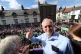Labour leader Jeremy Corbyn watches the parade from the balc