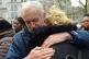Jeremy Corbyn hugs a woman after the Grenfell Tower National