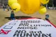 Greenpeace activists prepare to fly a banner in Parliament S