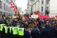 Police officers hold back protesters taking part in an anti-