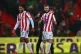 Stoke City manager Nathan Jones with Ashley Williams and Joe