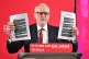 Labour leader Jeremy Corbyn holds a redacted copy of the Dep