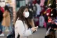 A woman wearing a face mask in London