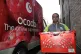 A delivery driver for Ocado online supermarket delivers a sh