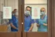 Medical staff wearing personal protective equipment (PPE) wa
