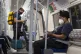 Commuters wearing face masks on the Jubilee line in central 