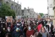People during a protest calling for the removal of the statu