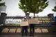 Activists from Stand Up to Racism hold a demonstration outsi
