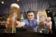 Barman Matthew Williams serving drinks at Scotts in South Qu