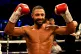 Kell Brook celebrates victory over Mark DeLuca in the vacant