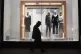 A man walks past a closed shop on Regent Street in central L