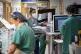 Staff nurses work in the corridor in the Acute Dependency Un