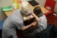 Nana Kwabena Edusei receives an injection of a Covid-19 vacc