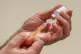 NHS staff prepare to administer a Oxford/AstraZeneca Covid-1