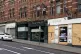 A row of boarded up shops in Nottingham City Centre