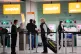 Passengers checking in at Gatwick Airport