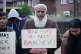 People take part in a protest outside Yorkshire County Crick