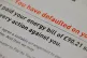 An energy bill claiming that the customer has defaulted on p