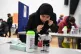 A student taking a lateral flow Test at Hounslow Kingsley Ac