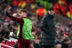 Liverpool's Harvey Elliott speaks to manager Jurgen Klopp to