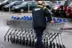 A Tesco employee collecting trolleys at a Tesco store in Bur