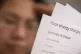 A person holding an energy bill