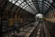 Empty tracks in Kings Cross train station in London as membe