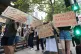 People protest outside the Ofgem HQ in Canary Wharf London.