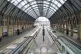 Empty platform and stationary trains at Kings Cross station 