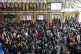 Passengers wait at the barriers at King's Cross station in L
