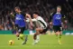 Tottenham Hotspur's Harry Kane and Fulham's Antonee Robinson
