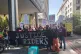 Deliveroo riders gather outside 100 Bishopsgate, London, to 
