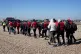A group of people on a beached after thet were rescued from 