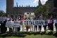 People protesting in Parliament Square in London on annivers