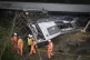Workers at the site of the deadly 2020 Stonehaven crash