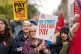 Lecturers and other university staff take part in a rally on