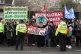 People take part in a protest opposite the Israeli ambassado