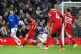 Everton's James Tarkowski challenges Liverpool's Alexis Mac 