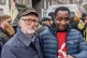 Jeremy Corbyn with striking security guards represented by t