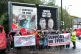 Unite members in front of a billboard promoting the campaign