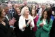 Sinn Fein's Vice President Michelle O'Neill, centre, reacts 