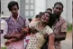 Relatives of a blast victim grieve outside a morgue in Colom