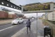 Public message on a screen at bus stop on East Bridge Street