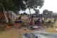 Residents displaced from a surge of violent attacks squat on